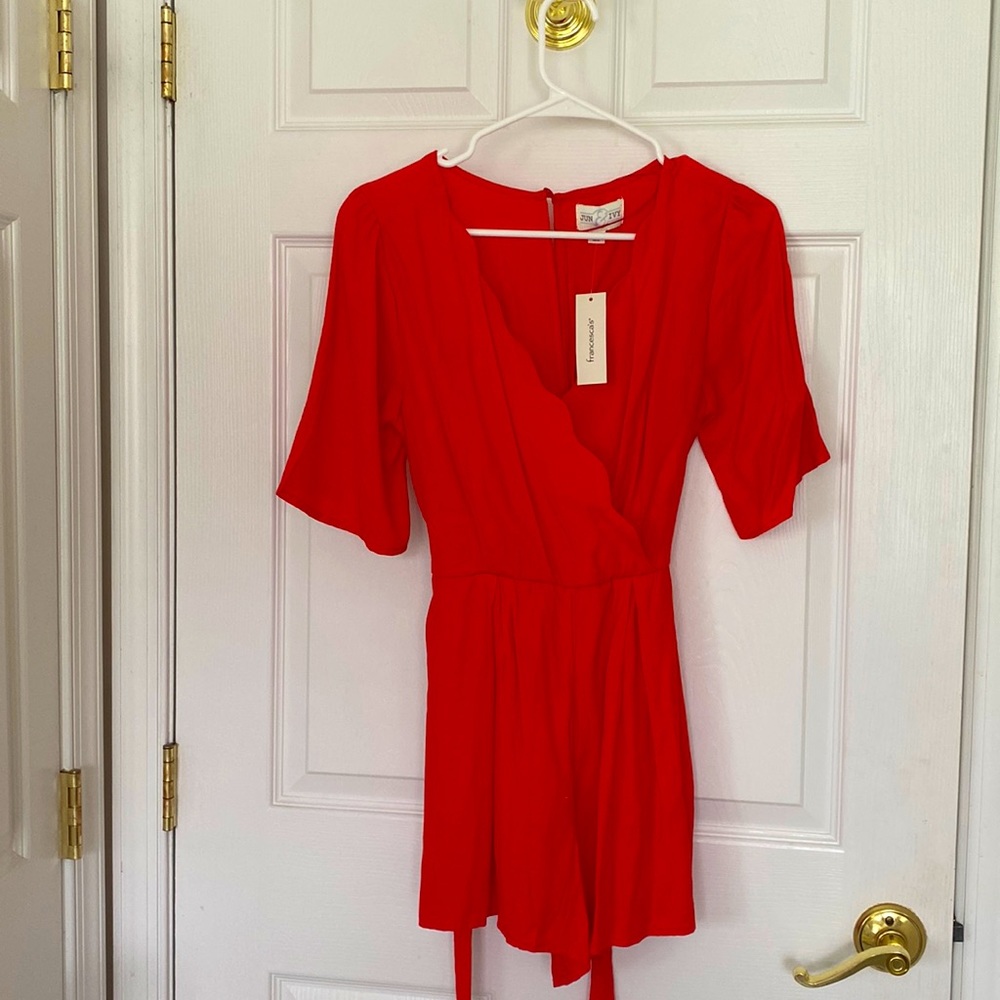 Red romper.